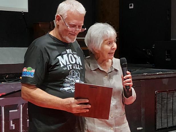 HOME director Preston Crow presents Carla Perry with a plaque from the Texas Department of Criminal Justice’s Lindsey Unit in Jacksboro, recognizing her support for returning offenders who need a safe place to rebuild their lives after incarceration. Ph