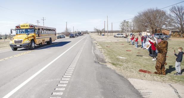 The Cubs received a big send-off and escort as they left Olney for the match-up with the Cisco Lobos, later defeating the Lobos and capturing the Bi-District title. Photo by Will Sadler