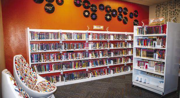 The Teen Room features colorful egg-shaped chairs and shelves of Young Adult books. Photo by Will Sadler