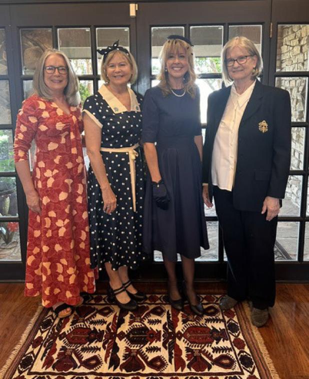Junior Altruistic Club members pose for a photo outside their opening meeting, where they dressed in vintage clothing to mark the club’s 100-year celebration. The group will hold a special meeting for current and former members at the Olney Country Club