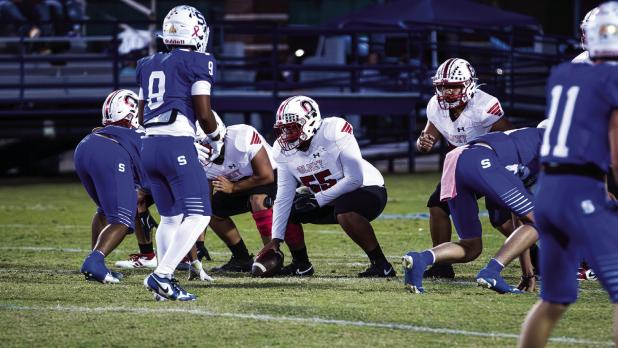 Cub #55 Peyton Bedford playing center enjoys his last year as a Cub. Bedford was out with injury most of the season but recovered in time to finish his time at OHS with fellow Cub’s brothers playing football. Photo by Will Sadler
