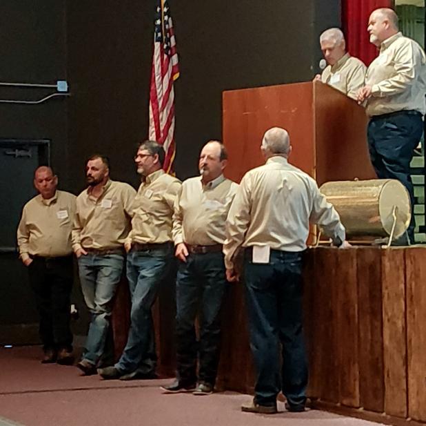 Brazos Communications personnel give out prizes at the company’s annual meeting on Oct. 10 at the Olney High School Auditorium. Photo by Gina Keating