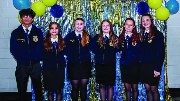 NHS FFA 2024-25 Outgoing Officers: President-Kamalani Duffield, Vice President-Sara May, Secretary- Elizabeth Daigle, Treasurer-Addison Riley, Reporter-Kourtney Whitfield and Sentinel-Jason Moreno. Photo by Will Sadler