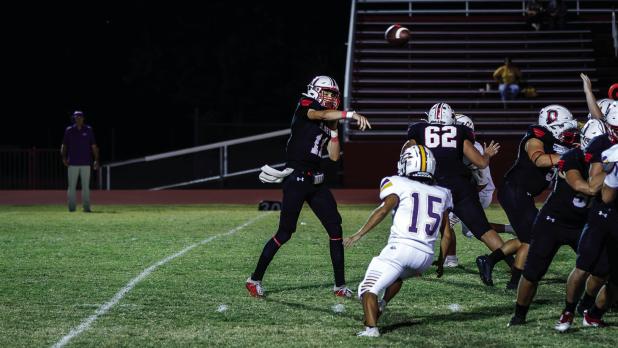 OHS Cubs #11 Tucker Cortinez has found his groove over the past two games and showed up for a huge game against the Chiefs with 18-23 completions, 342 passing yards and 4 touchdowns. Photo by Will Sadler