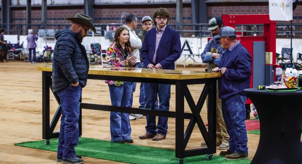 This year’s ag mechanics competition had low numbers but still offered special moments to make lasting memories like this brother-and-sister team. Marlee [L] and Luke [R] Lane [pictured center] from Olney FFA working together to manufacture a table and 
