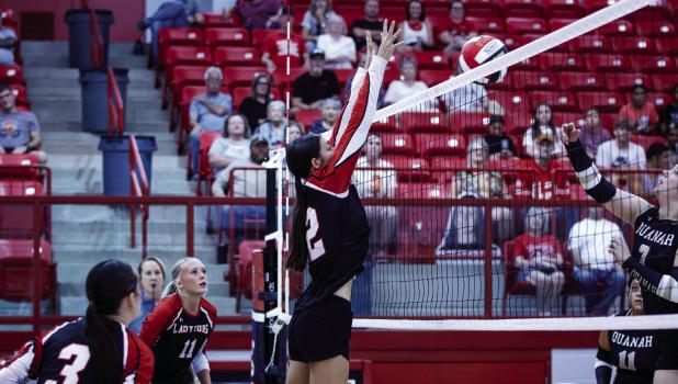 Lady Cub #12 Halee Craven blocks at the net and was a fierce player on offense and defense against the Lady Indians. Photo by Will Sadler