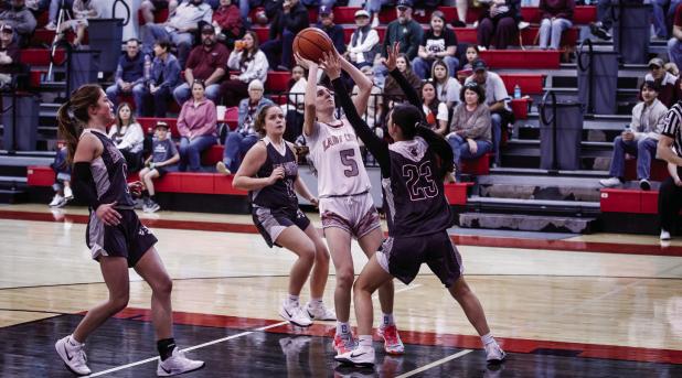 OHS Lady Cub #5 Oaklan Hopkins continues to gain experience on a Varsity level and is a great contributor on the boards, hitting one outside the line and sinking 3 free throws. Photo by Will Sadler