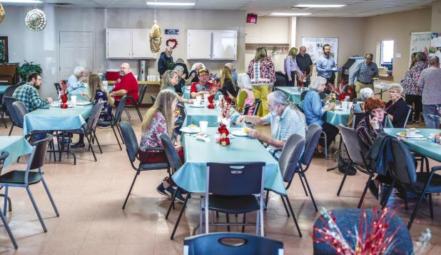 The Cub Center Souper Bowl fundraiser packed in large numbers both in the dining room and to-go meals, which were picked up or delivered by friends and family. Photo by Will Sadler