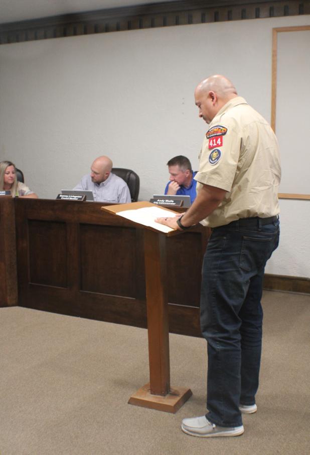 American Legion District Commander and Olney Scout Leader Chris Garcia addresses the City Council on plans for the scout hut. Photo by Gina Keating