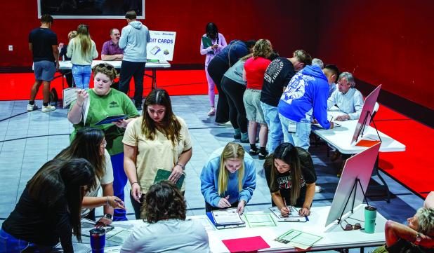 Texas A&M AgriLife Extension puts graduating seniors through a live simulation of what they can expect financially after living on their own. Photo by Will Sadler
