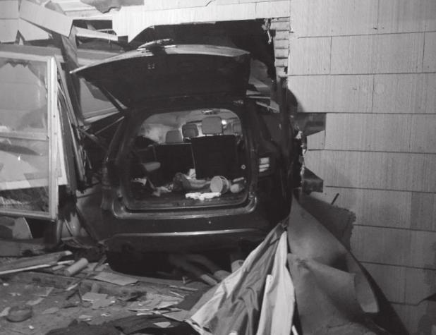 Car Crashes into Living Room