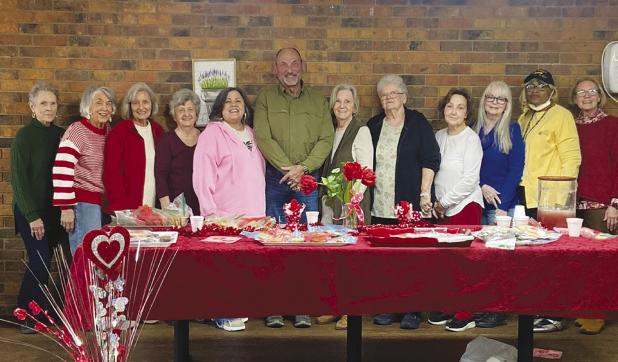 Attendees at the Amity Club’s February meeting included (L-R): Carolyn Penn, Nita Hearne, Phyllis Whitsitt, Jeanie Spivey, Monica Bland, Greg Buenger, Judy Moberly, Kathy West, Margie Snyder, Judy Averett, Gail Spears, and Carol Vorel. Photo by Monica B
