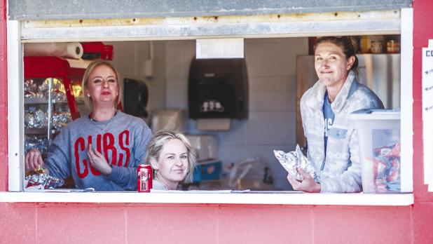 The Olney Athletic Booster Club and volunteers manned the concession stand for the OISD tourney, which at times got very busy with hungry fans and players. Photo by Will Sadler
