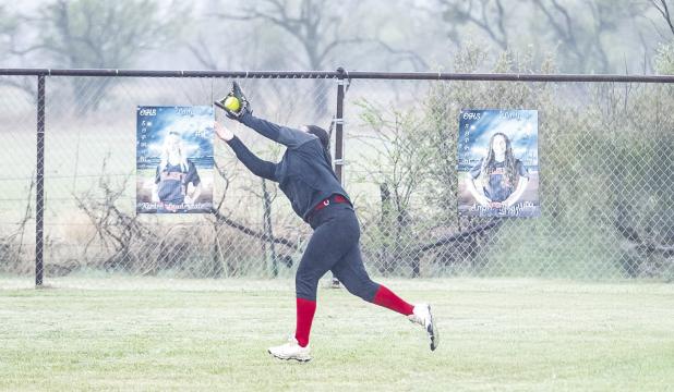 OHS Lady Cub right fielder #9 Allison Alvarado catches an out early in the matchup with the Lady Panthers. Photo by Will Sadler