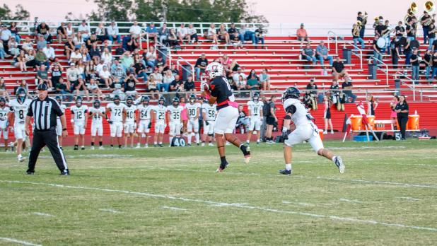 OHS Cubs #8 Eric German with a reception during the Alvord game. Photo by Will Sadler