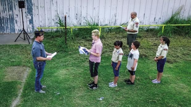 Olney American Legion Post 414 performs the flag retirement ceremony each summer to retire tattered flags with a ceremony. Participants of the event were [L-R] Post 414 Commander Eric Loggins, James Garcia, Charlotte Garcia, Jerry Dowdy, Katherine Garcia,