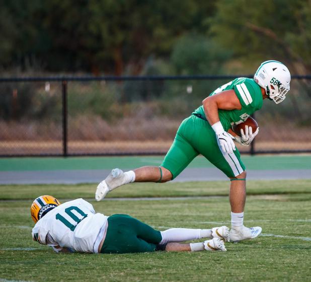 NHS Bobcat #56 Cooper Clayton C/NG caught a bullet off his back heel, quickly dispatched the #10 Guthrie defender, and strolled into the end zone, opening up the first quarter and pressing down a Bobcat gas pedal that never let up till the end of the firs