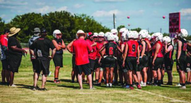 Olney ISD Athletic Director and Head Cub Football Coach Dustin Altmiller instructed Cubs during football practice. Photo by Will Sadler