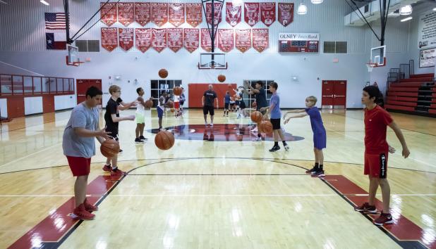 New basketball coach hosts