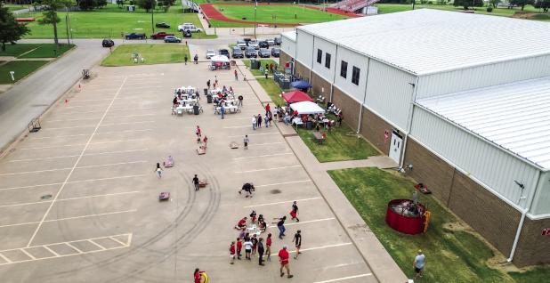 The Olney Athletic Booster Club hosted a fundraiser to pay for items needed by the OISD Athletic Department but not budgeted by OISD. This was the Club’s first Tailgates and Tacos event that included tacos, a dunk tank, cornhole and much more, all for a