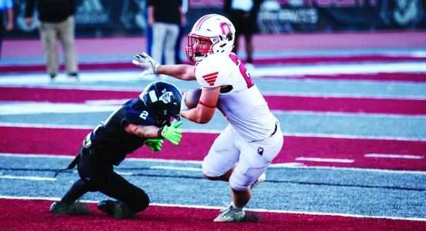 Cub #22 Kyle Stewart RB owned the middle of the field during the district match-up and came away with 93 yards rushing and 2 touchdowns. Photo by Will Sadler
