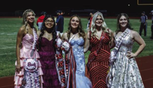 (Right): This year’s HOCO Queen nominees posed with last year’s Queen before being escorted on the field for Queen announcement. [L-R] Bradi Bowers, Allison Alvarado, Rae Bond, Clara Neal [last year’s OHS HOCO Queen] and Morgan Simmons. Photo by Wil