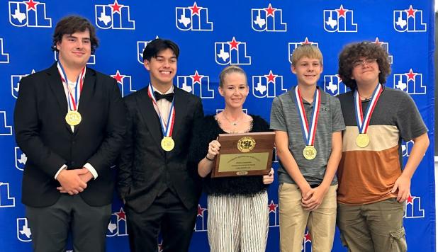 The Olney High School Computer Science Team poses with their first-place trophy and medals. The team consisted of OHS Salutatorian Caleb Johnson, Valedictorial Aidyn Bitner, coach Sabrina Laurent, Jaxx Laurent and Nate Elmore. See more UIL photos on Page