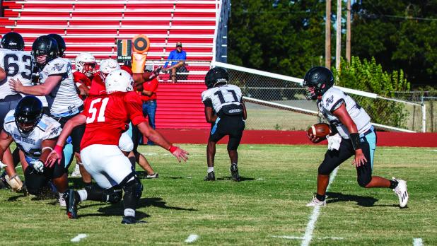 The Cub defensive line and backs will have many weapons this season; #51 Isaiah Burdick beat the offensive end almost every play, pressuring the Eagles to look for different routes. Photo by Will Sadler