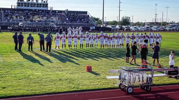 The Cubs Varsity football team line up for their first game in district play at Quanah on Friday, Aug. 28. The team lost to Quanah, 12-35. Photo by Ashley Bint