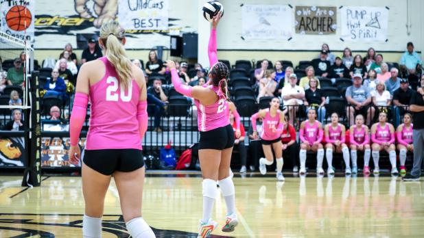 OHS Lady Cub #23 Aubree Englishbee sends a volley over the net to Ladycat defenders.
