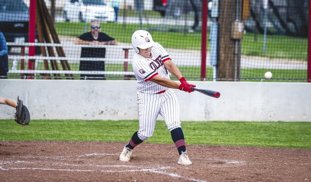 OHS Senior Cub #21 Ricco Sandoval at bat during Cub Senior Night. Photo by Will Sadler