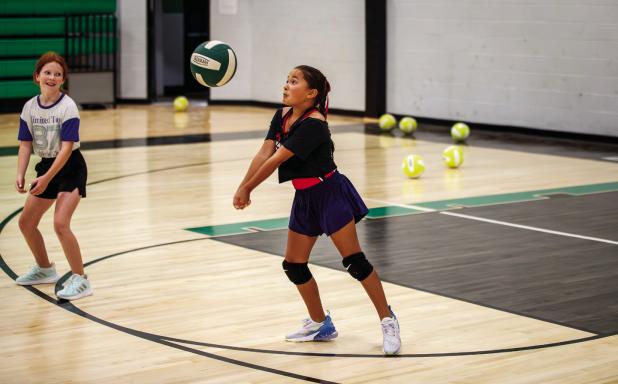 Brie Moulder practicing during volleyball skills session. Photos by Will Sadler