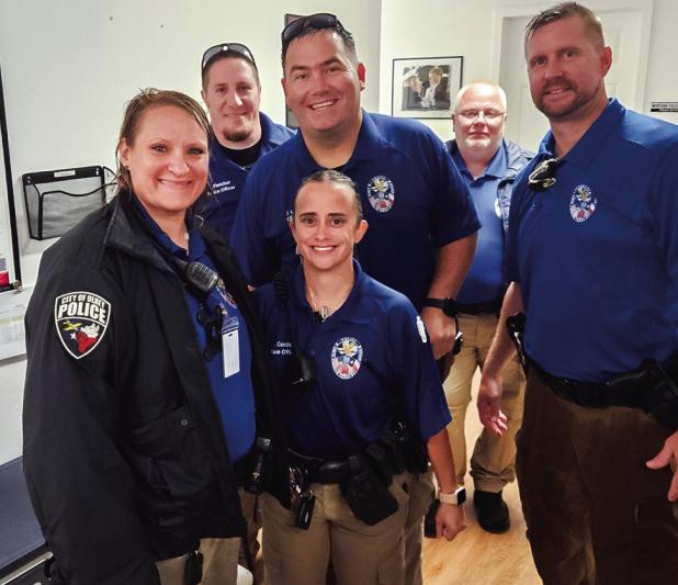 The Enterprise would like to thank the Olney Police Department and highlight the work of its officers, shown here, waterlogged, after staffing the Olney in American celebration on July 3 in the rain for several hours. The fireworks may have been canceled 