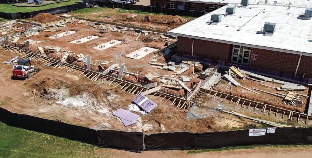 Construction of storm shelters and new classrooms at the Olney Independent School District is on track for completion in 2026. Photo by Will Sadler