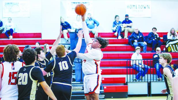 OHS Cub #24 Peyton Bedford excels on defense and plays with a ton of passion every time he steps on the boards, Peyton scored 2 for the night on a floater. Photo by Will Sadler