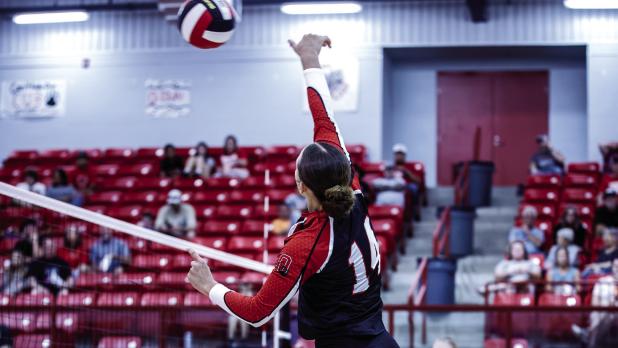 Lady Cub #14 Angel Turner has been making her presence felt at the net, delivering lethal blocking and sending kills across the net. Photo by Will Sadler
