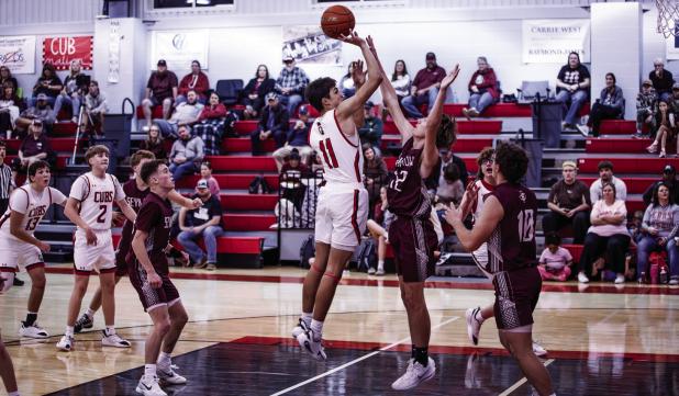 OHS Cub #11 Tucker Cortinez tipped the Cubs off and scored 2 from the outside against the Panthers. Photo by Will Sadler