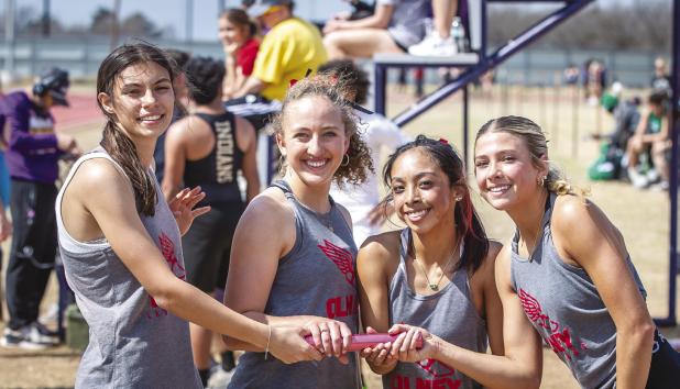 OHS 4x1 team will move on to compete at Regionals after qualifying at the Area track meet in Graham. Your OHS 4x1 runners are [L-R] Hallee Craven, Mackenzie Berngen, Anastasia Vasquez and Bradi Bowers. Photo by Will Sadler