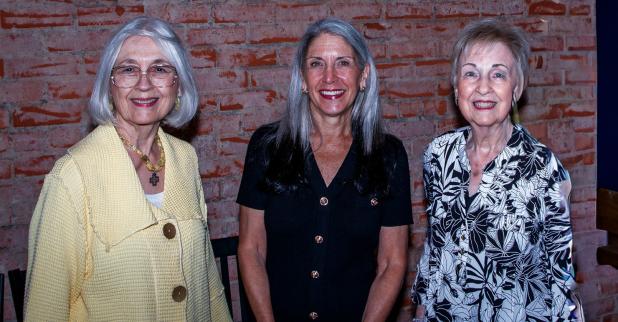 Heritage Museum docents Ann Cumpton and Barbara Larimore helped organize the Raven 23 book signing at Hudson’s on Main. Docents Lisa Lunsford, Anna Rogers, Trudy Capps, and Syndal McClatchy were not able to attend. Photo by Will Sadler