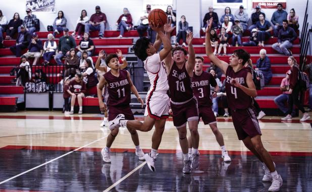 OHS Cub #5 Damian Hernandez hit for one outside the line and one floater for 5 points against the Panthers, Damian shined on defense and helped keep the score within reach most of the game with a smothering defense. Photo by Will Sadler