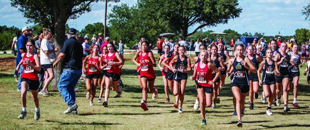 The OJH Lady Cubs set the pace during the OHS Invitational Cross Country Meet at the Olney Country Club, and never let up, earning a first-place finish! Photo by Will Sadler