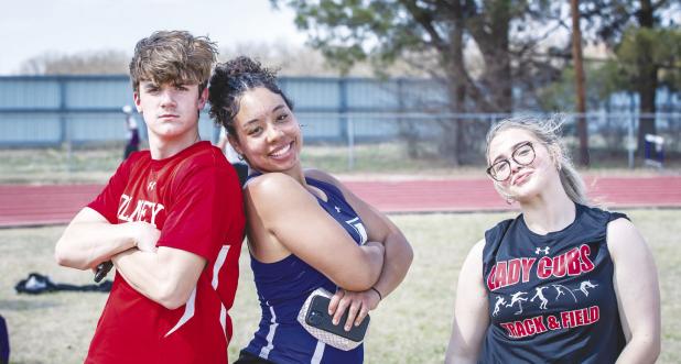It’s not all work and competition at the Munday track meet: students from different schools have a chance to socialize, meet new friends and visit with friends already made from all over the district. Photo by Will Sadler