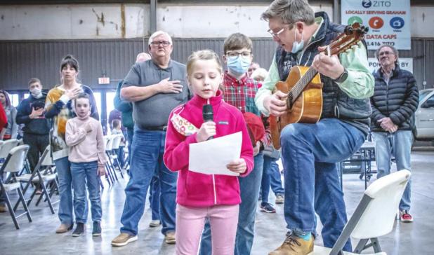 Kicking off the rabbit show: Emerald Edgington singing the National Anthem. On guitar - Emerald’s father, Chad Edgington (Pastor of FBCO)