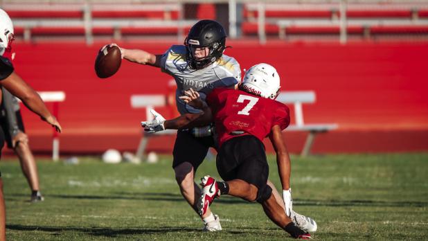 Cub defenders had the Indians scrambling in the backfield for most of the scrimmage. Photo by Will Sadler