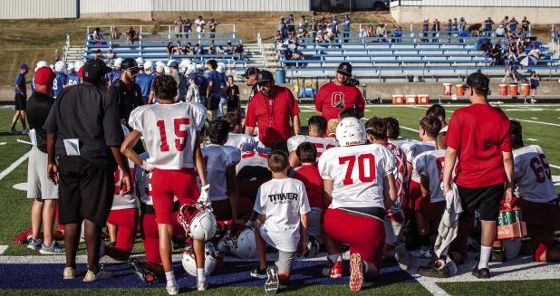 Coach Dustin Altmiller is tapped for the OISD Athletic Director and Head Cub Football Coach position. Shown here giving notes over the scrimmage against Windthorst Trojans. Photo by Will Sadler