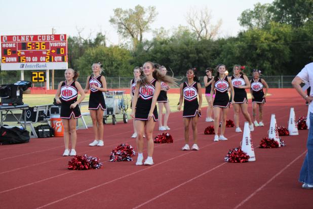 The Olney Cheerleaders kept the crowd energized during a nailbiter of a game, in which the lead changed hands several times. Photo by Gina Keating
