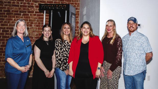 Chamber board members gather at the Olney Heritage Museum for the first Mix & Mingle networking event of 2026. L-R: Kris Kamp, Tatum Wiley, Kaylah Hampton, Kimberly Smith, Ronda Bretting, and Eric Loggins. Photo by Will Sadler