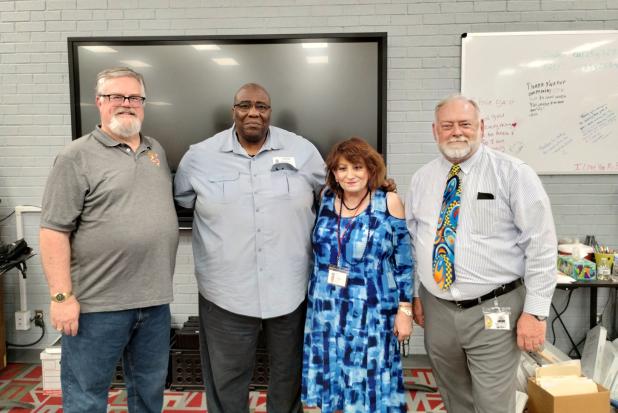 Dr. William Owens of Fort Worth (shown second from left with Olney ISD band co-directors Marilyn and Rodney Bennett) was the guest conductor, composer, and clinician for each Band class on March 19. Dr. Owens worked with OHS musicians on “To Sail the Ma