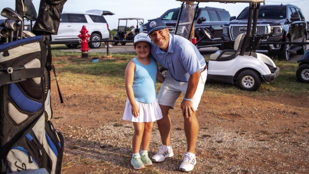 Emerson and dad Coby Styles came over from Windthorst to create some fun memories during the parent/child gold tourney. Photo by Will Sadler