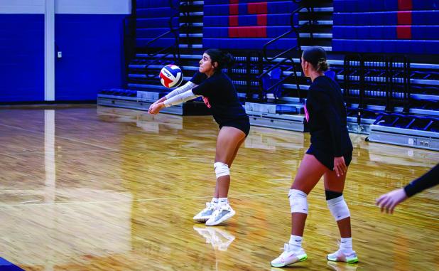 Ladycats shut down a kill shot during summer league in Graham. Photo by Will Sadler